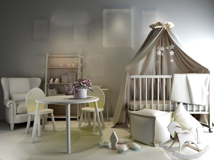 Una habitación de bebé con cuna con mosquitera.